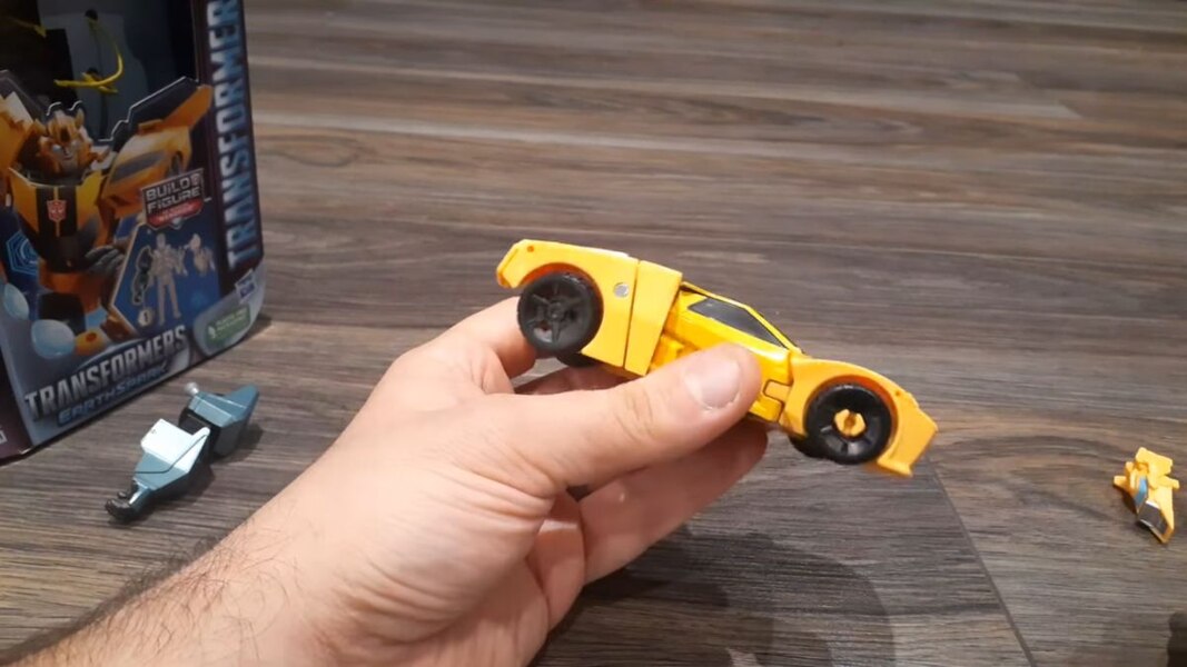 In Hand Image Of Transformers Earthspark Bumblebee Deluxe Class  (10 of 14)